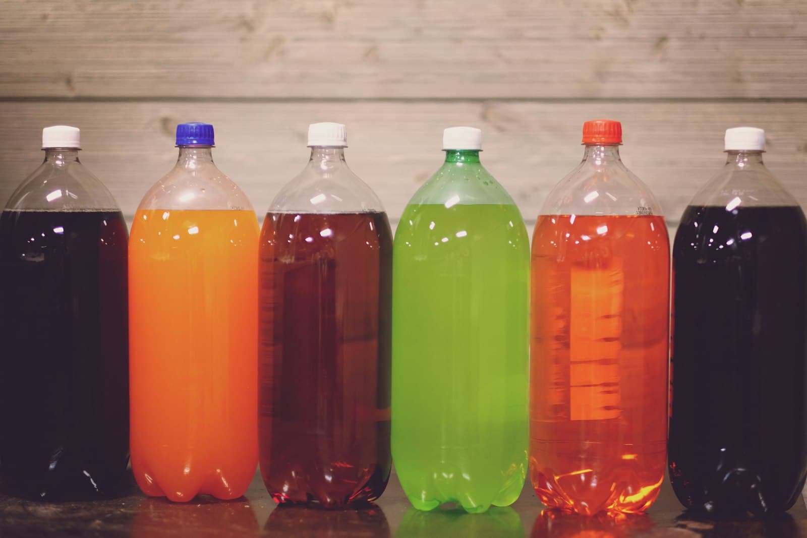 Brightly coloured ready-to-drink beverages in PET bottles