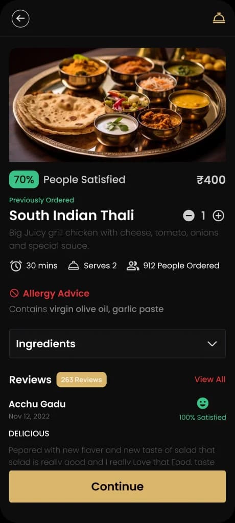 Dish detail screen of a food delivery app showing a South Indian thali with price, prep time, allergy advice and customer reviews