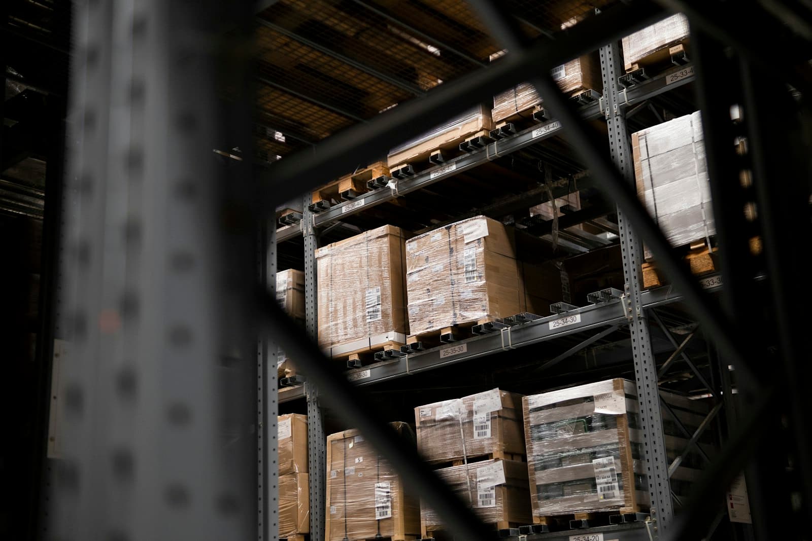 Warehouse racking with stored goods on pallets